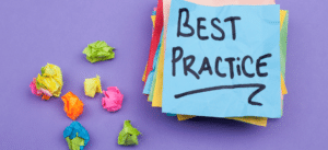 A colorful stack of crumpled and smooth sticky notes on a purple background, with the words “Best Practices” written on a blue sticky note on top. The image conveys creativity, brainstorming, and organization in a visually appealing way.