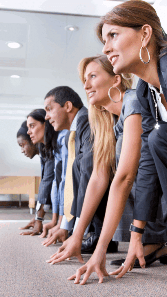 Diverse group of business professionals in suits lined up at a starting line in an office, symbolizing competition and strategic readiness for Google Gemini.